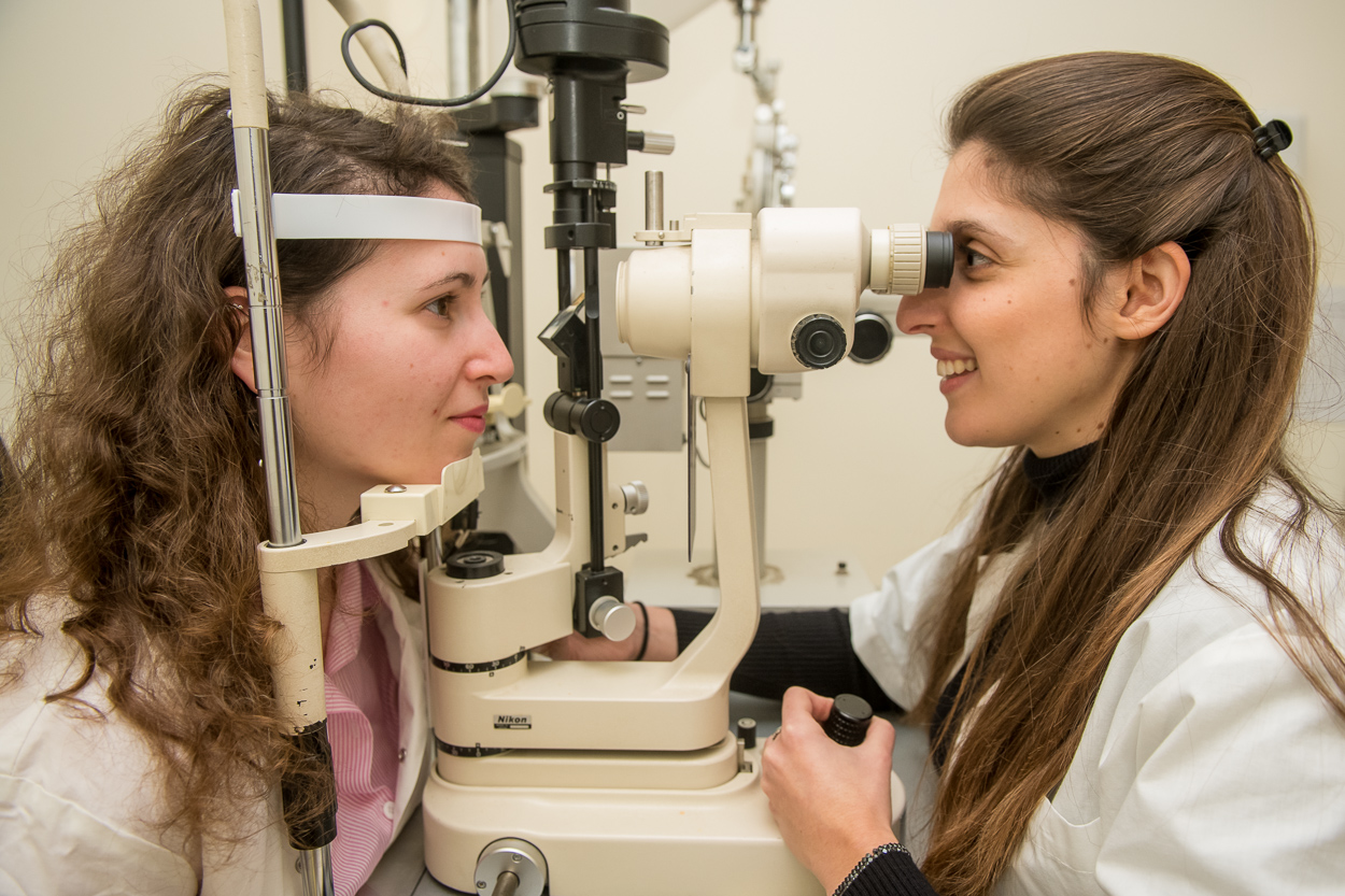 An optometry student with patient doing an Eye examination